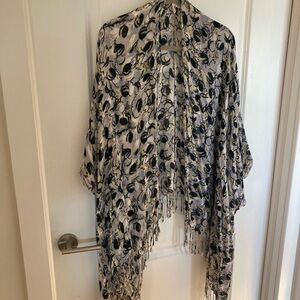 BCBG light weight shawl with sleeve holes and fringe